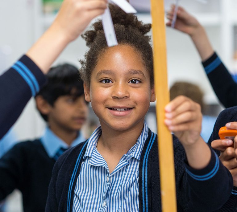 girl holding a stick