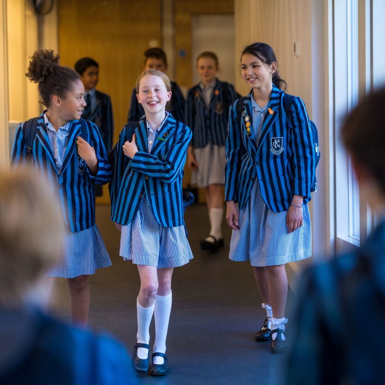 students walking down the corridor