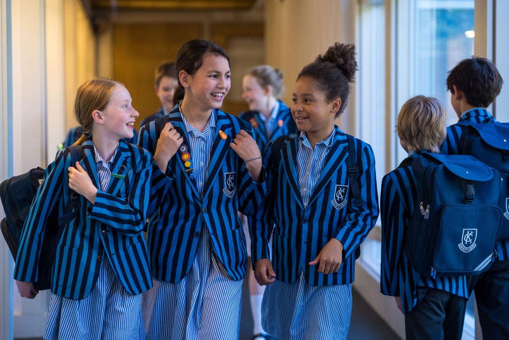 children walking in a hall