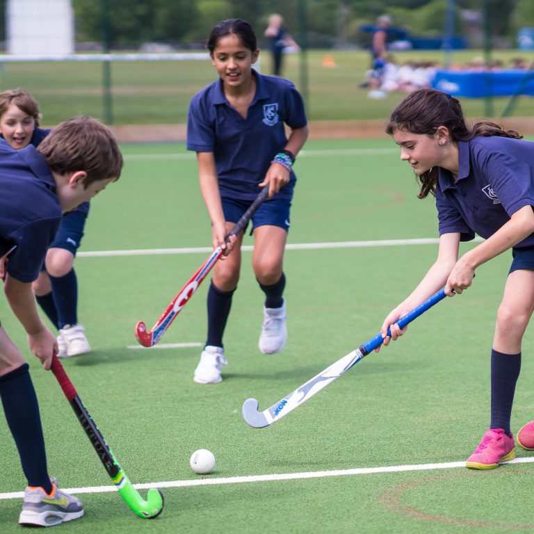 Students playing hockey