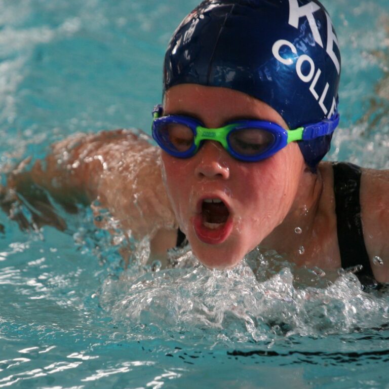 Student swimming in the pool