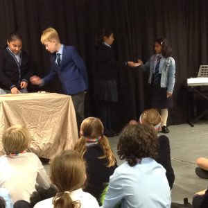 students doing magic tricks