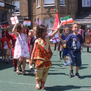 students holding flags from different countries