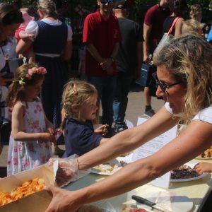 lady handing out food