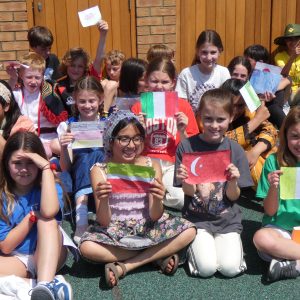 Students holding country flags