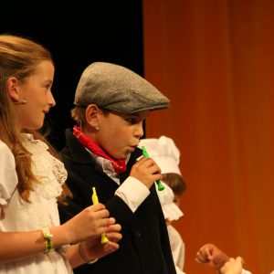 boy and girl on stage