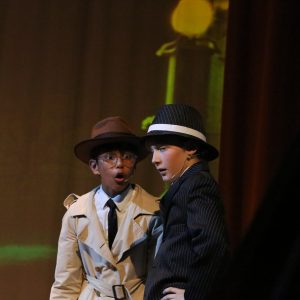 two pupils dressed as detectives