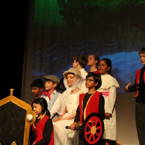 students performing a play