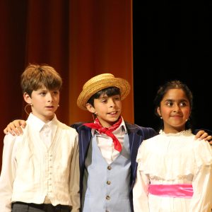 students performing in a play