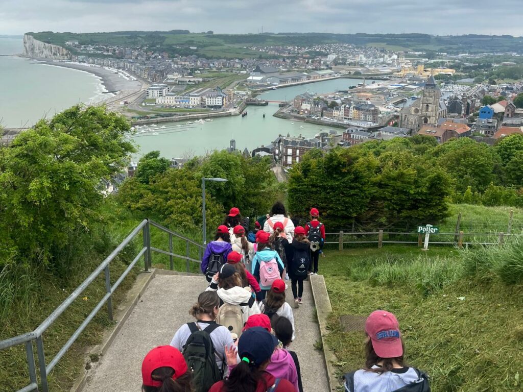 students waling down steps